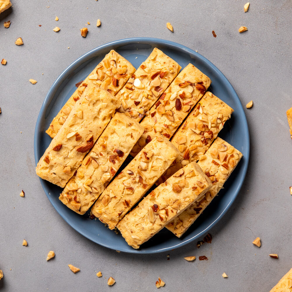 Plate filled with delicious almond stick bars, perfect for snacking