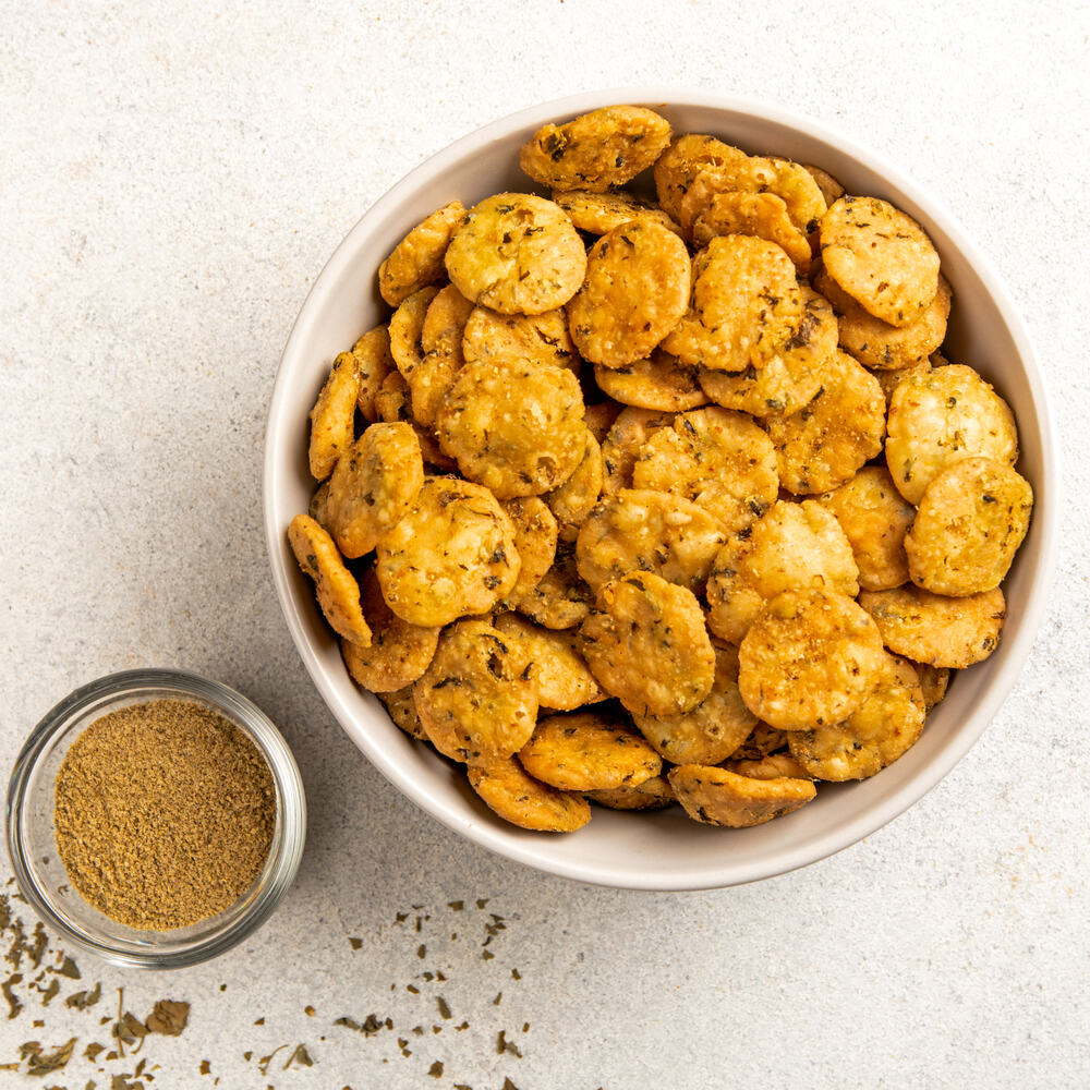 Bowl of mini circular masal suhalis, perfect for team time snacking