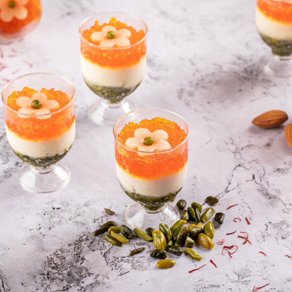 Layers of scrumptious Pistachio, Fresh Chenna & Kesaria Pethe Ka Lachcha in individual servings.