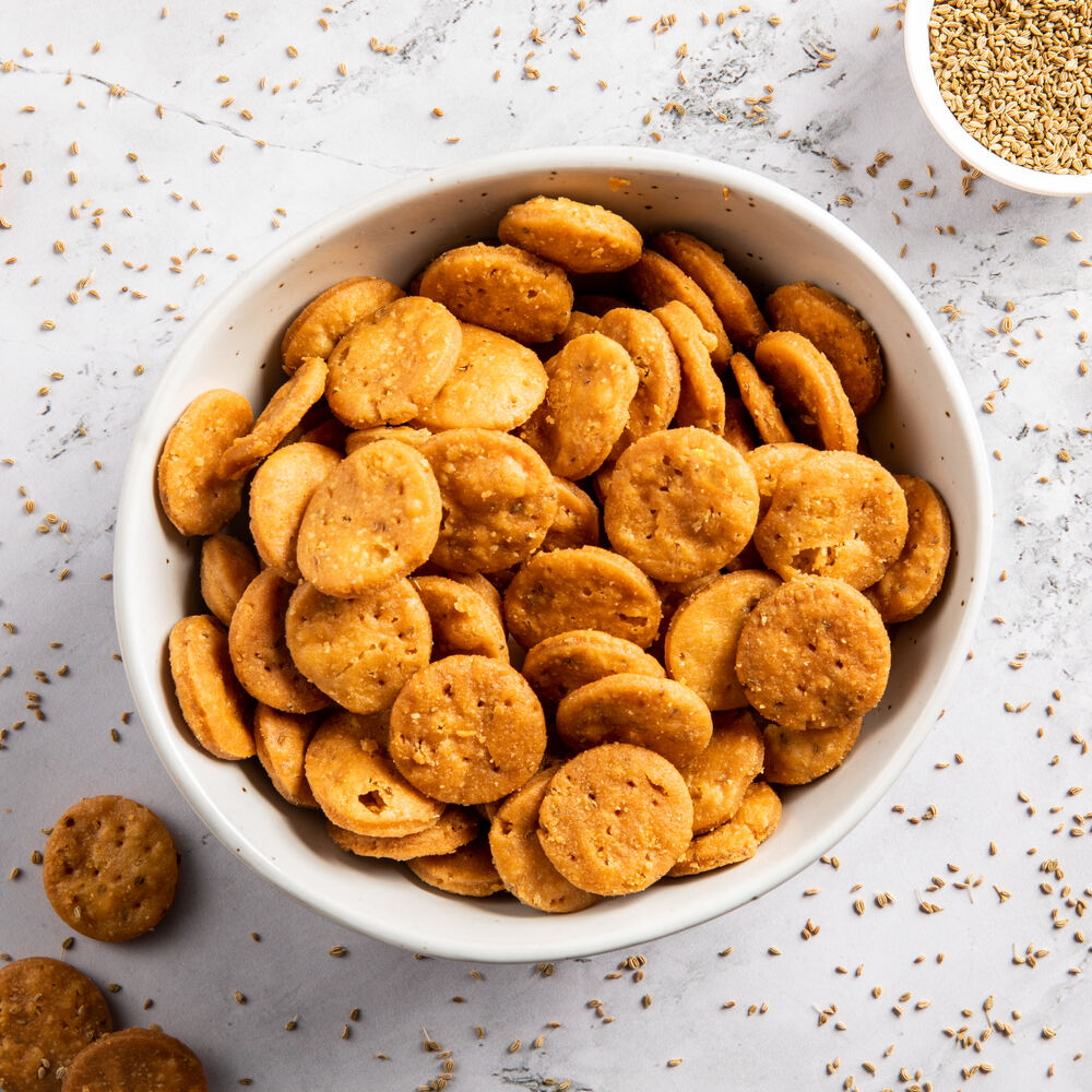Bowl filled with chatpata whole wheat mini suhalis